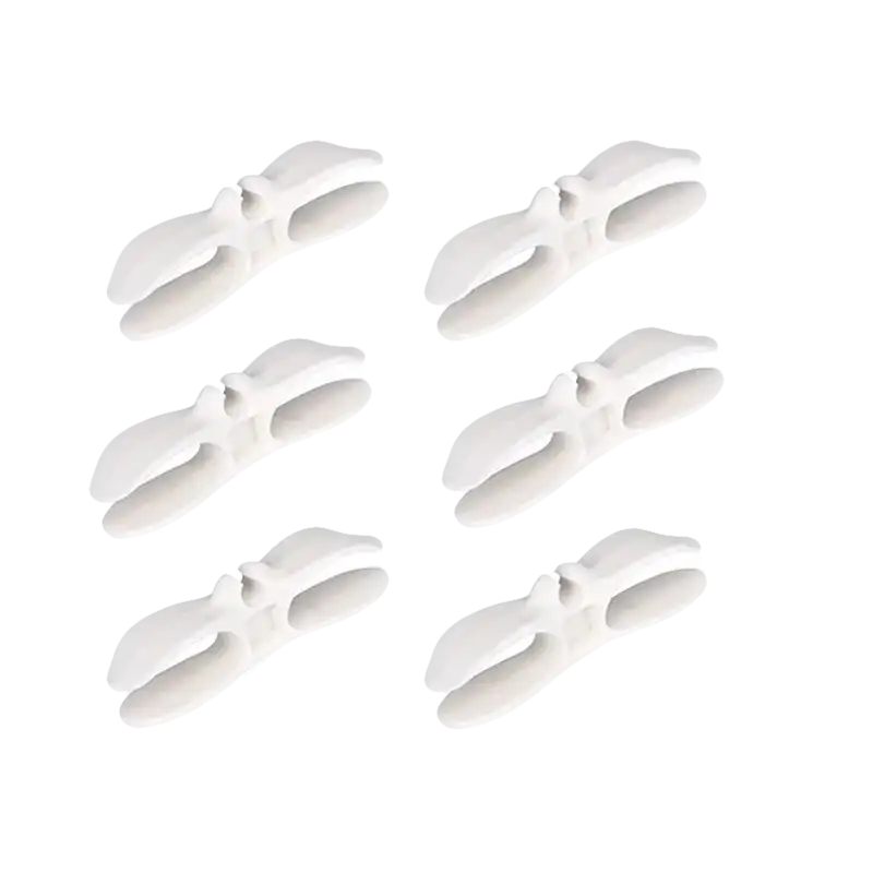 Six white plastic clips.