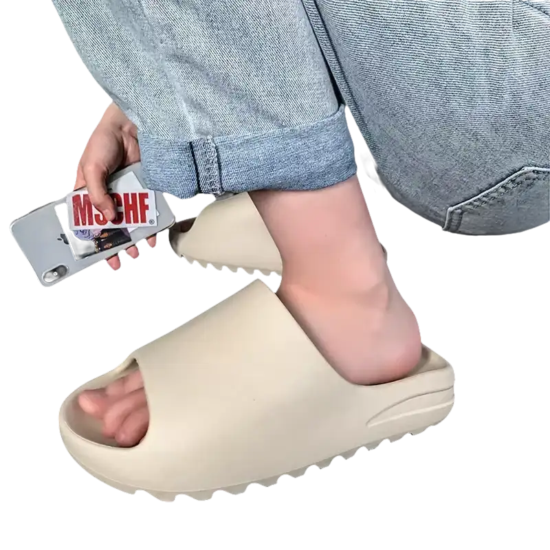 Beige slide sandal.