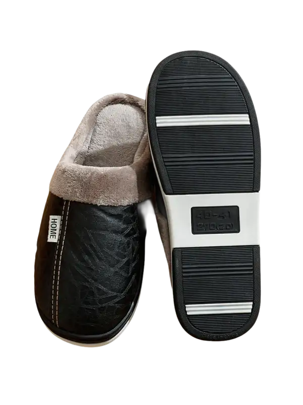 Black faux leather slippers with plush lining.