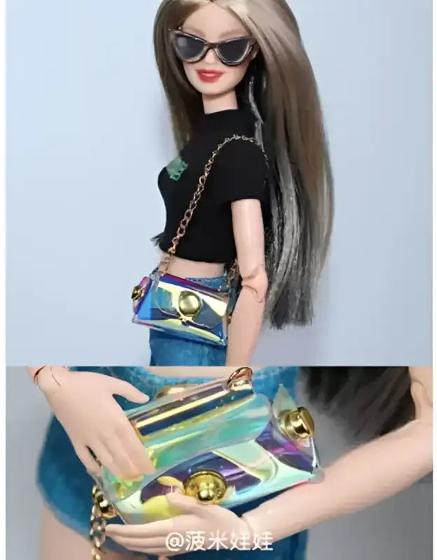 Barbie doll with iridescent purse.