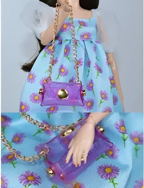 Doll wearing a floral dress and carrying a purple purse.