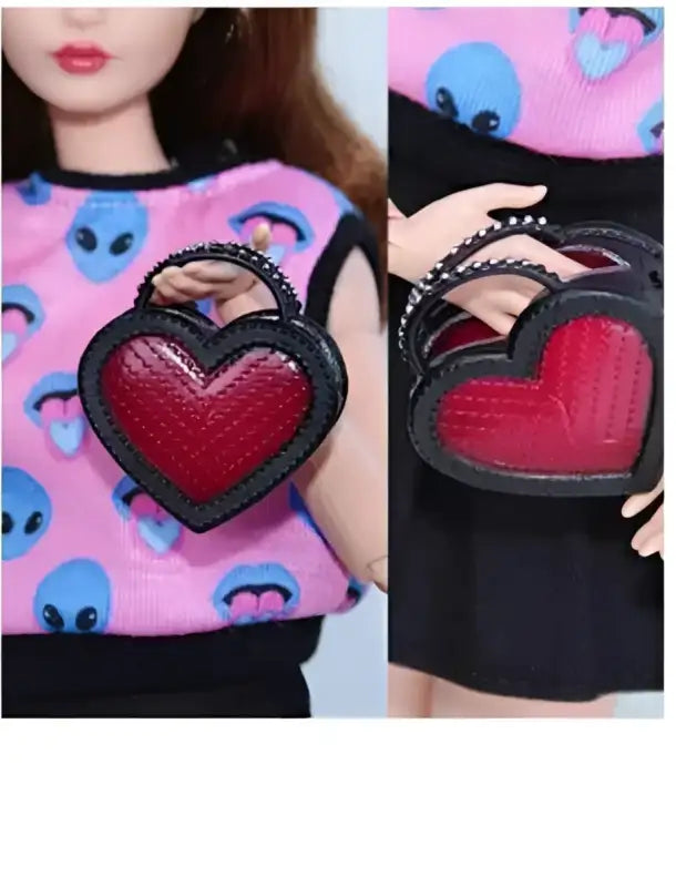 Heart-shaped purse with studded handle.