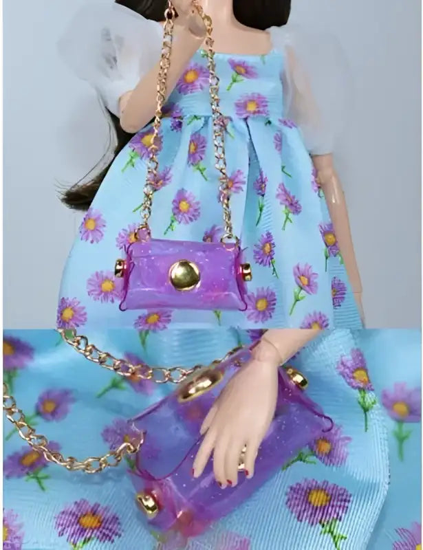 Doll wearing a floral dress and holding a purple purse.
