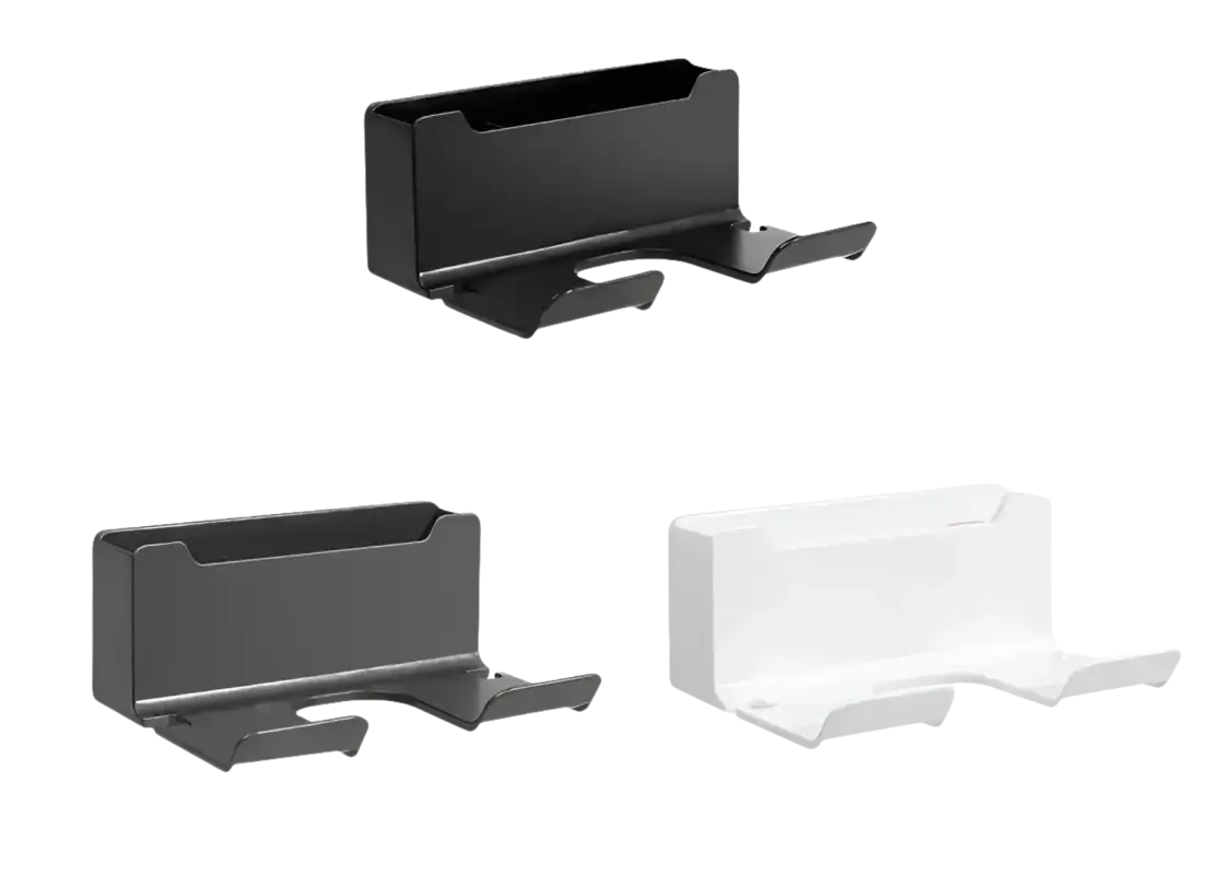 Three wall-mounted headphone holders.