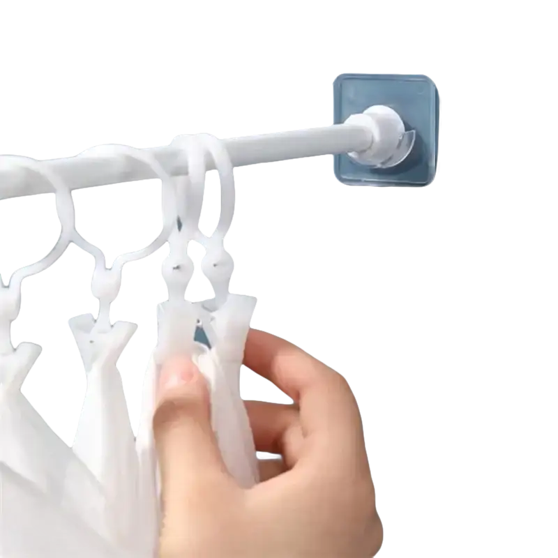 White plastic clothes drying rack.