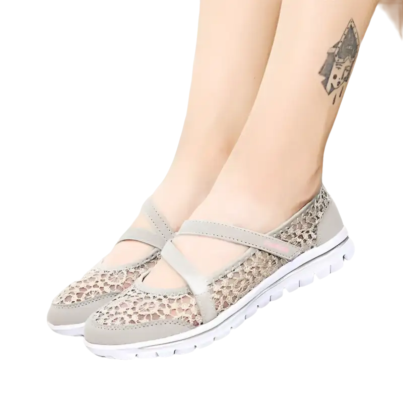 Gray lace-patterned slip-on shoes.