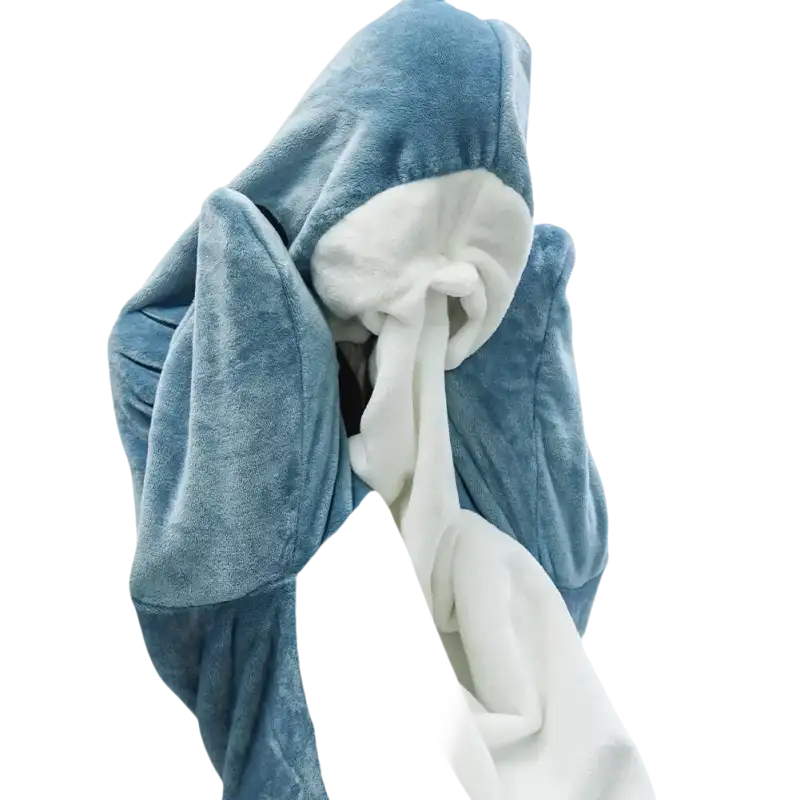 Blue and white plush hooded blanket featuring a trendy cartoon shark sleeping design