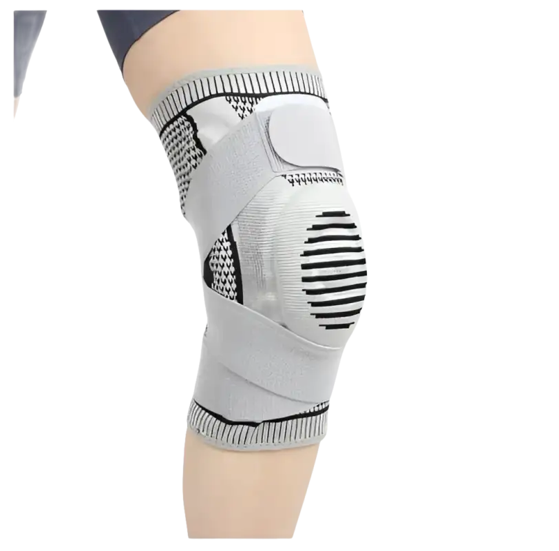 Gray knee brace with straps.