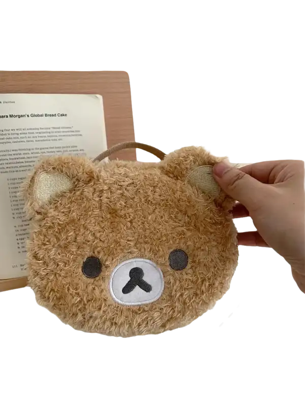 Fuzzy brown bear purse.