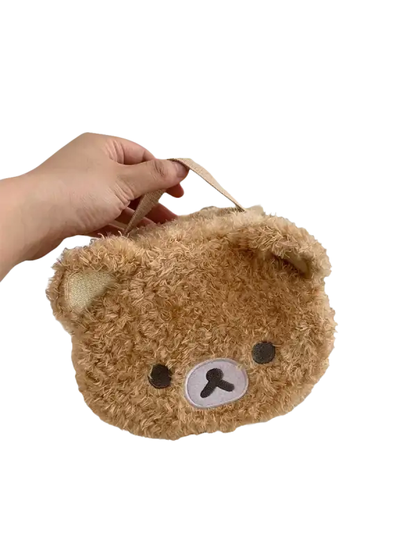 Fuzzy brown bear purse.