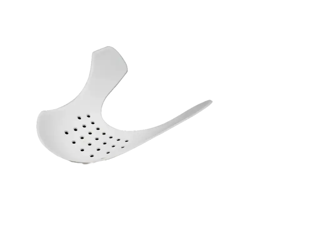 White perforated shoe shield.
