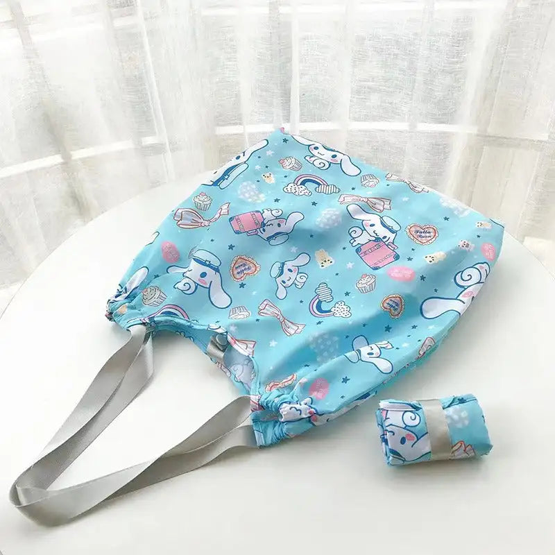 Blue cartoon-patterned tote bag.