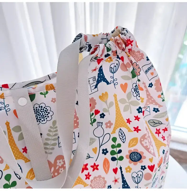 Floral Paris-themed tote bag.