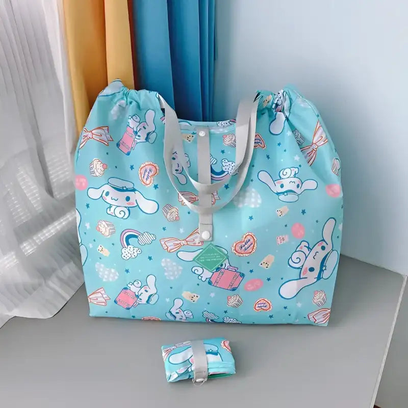 Light blue cartoon-patterned tote bag.