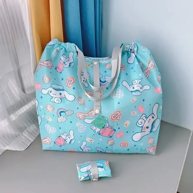 Light blue cartoon-patterned tote bag.