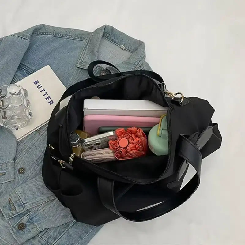 Open black tote bag.