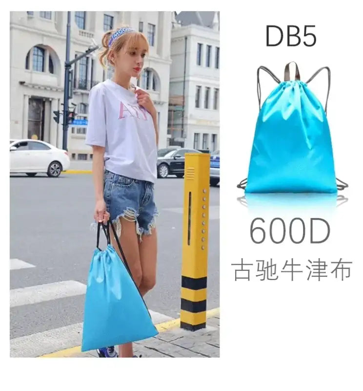 Blue drawstring backpack.