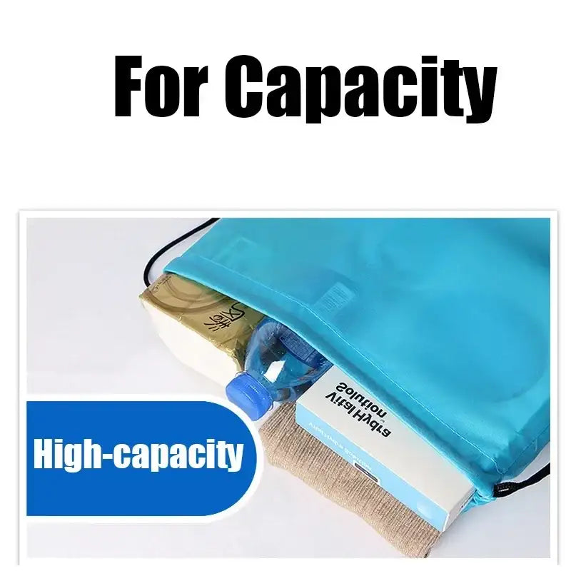 Blue drawstring bag filled with items.