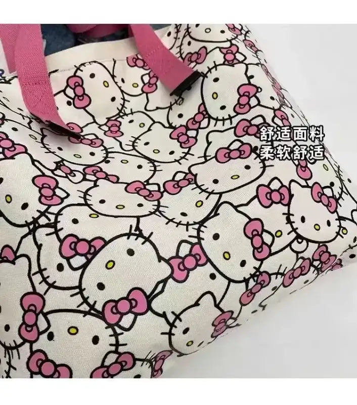 Hello Kitty patterned tote bag with pink straps.