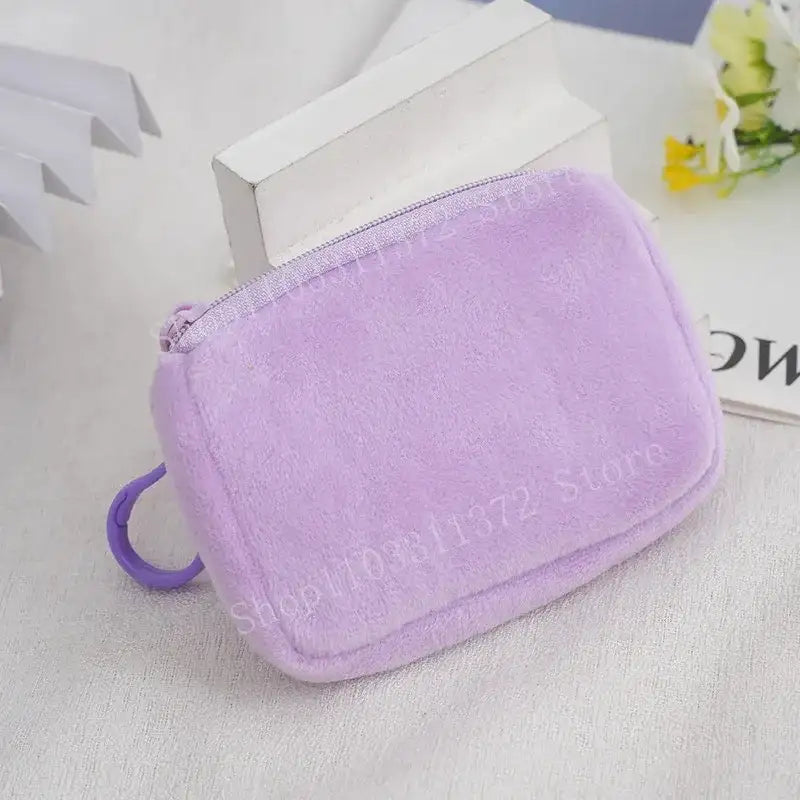 Lavender plush coin purse.