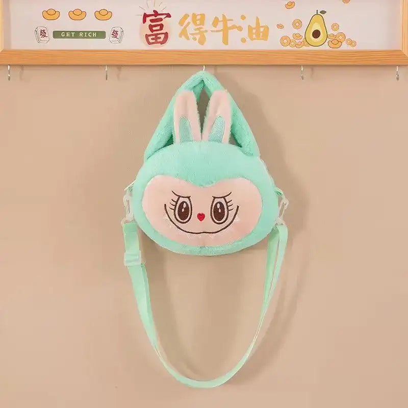 Mint green bunny purse.