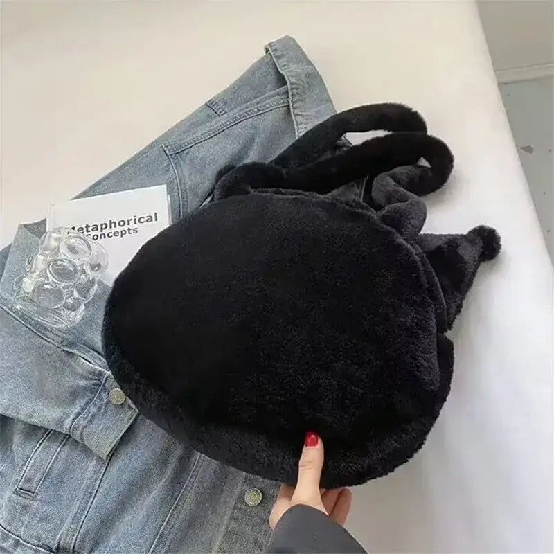 Black faux fur tote bag.