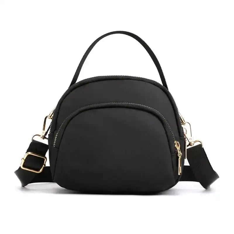 Black nylon crossbody bag.