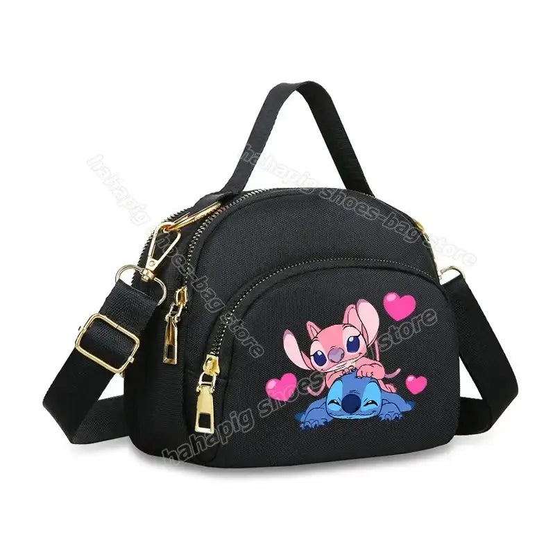Black handbag with cartoon characters.