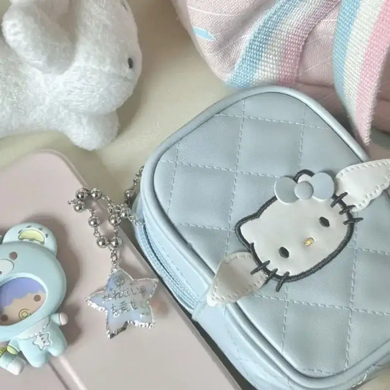 Light blue quilted Hello Kitty purse.