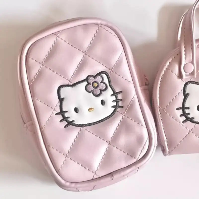 Pink Hello Kitty quilted bags.