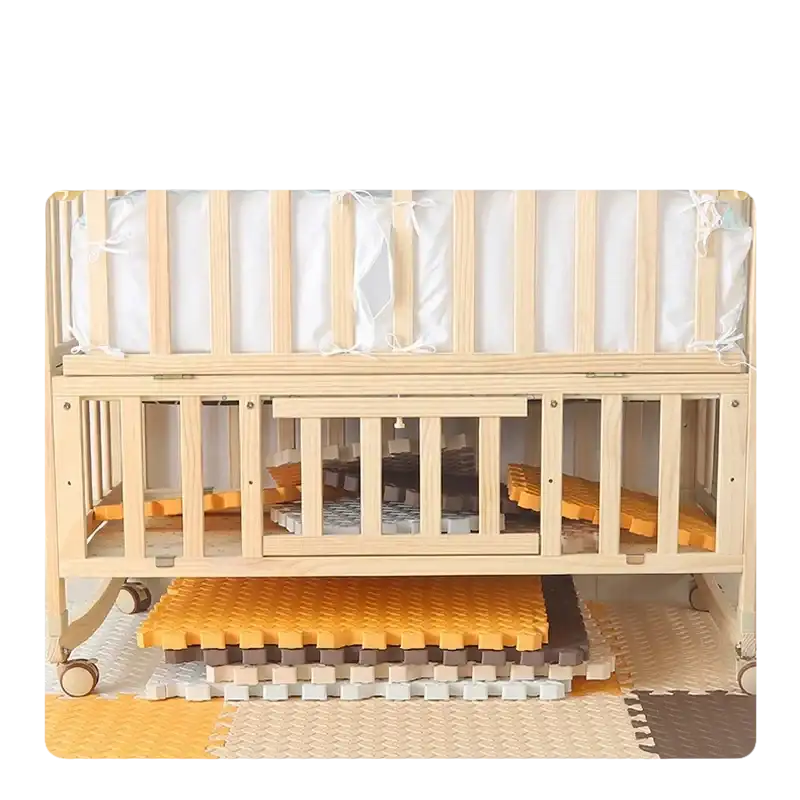 Wooden baby crib with storage.