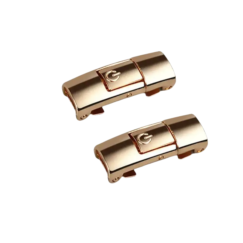 Two gold-colored magnetic press locks.