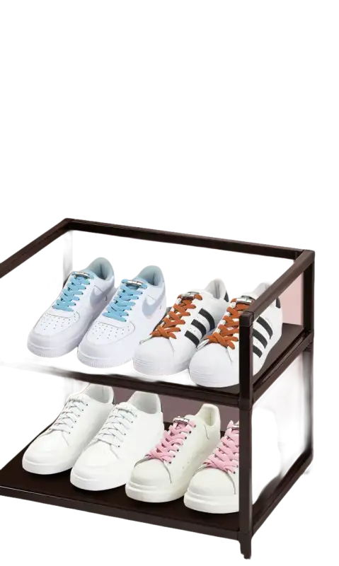 Two-tiered shoe rack with shoes.