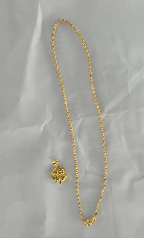 Golden Wave Pendant Necklace