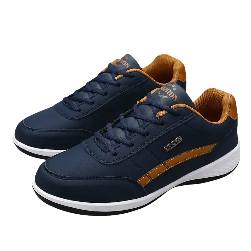 Pair of navy blue and tan sneakers.
