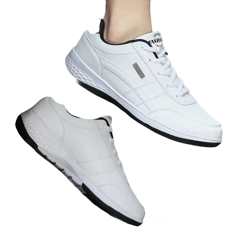 White leather sneakers with black trim.