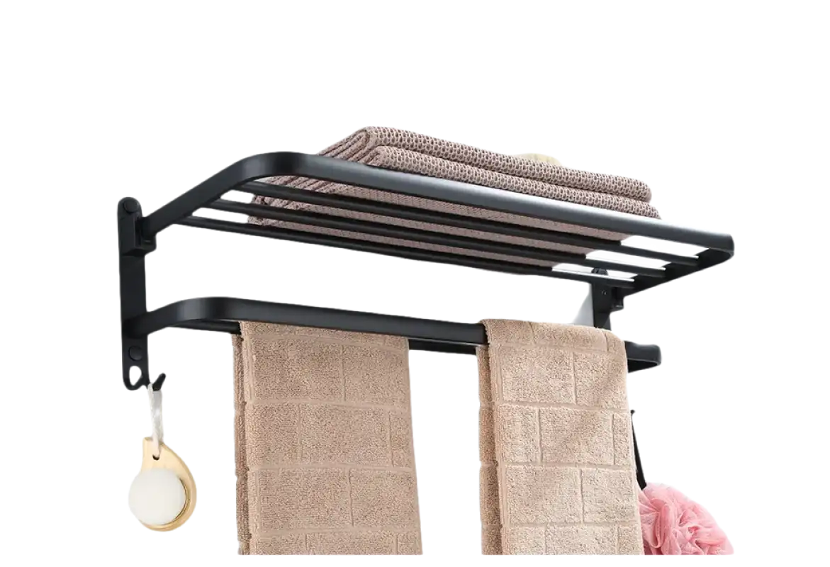 Black metal towel rack with towels.