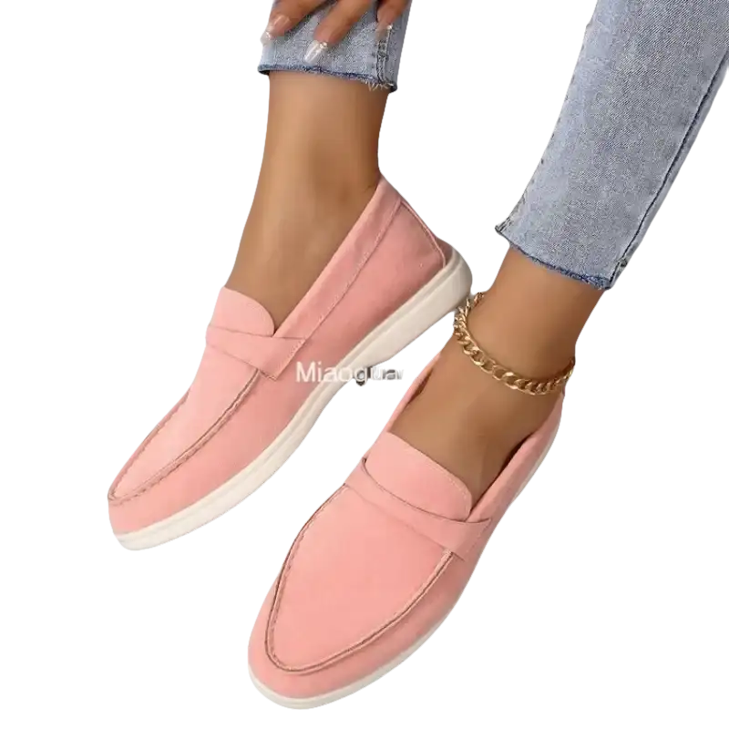 Pink suede loafers.