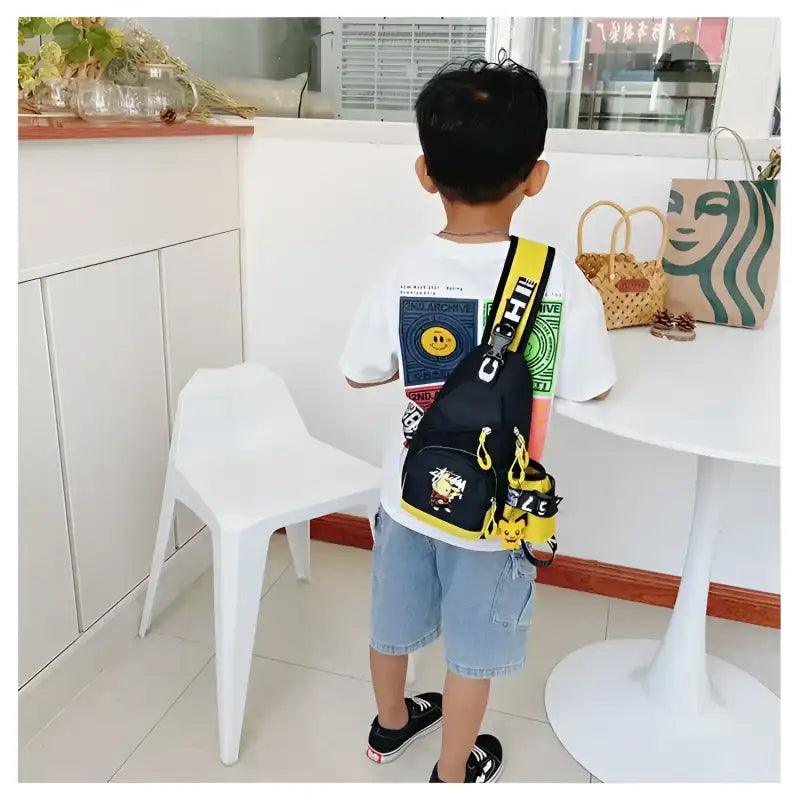 Boy’s black and yellow cartoon sling bag.
