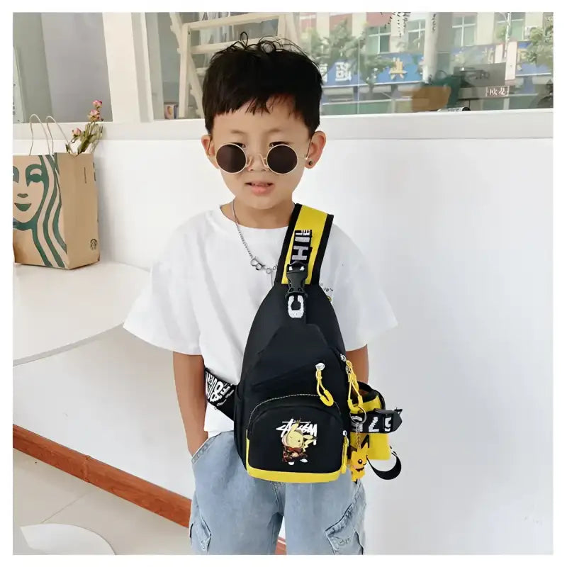 Boy’s black and yellow sling bag.
