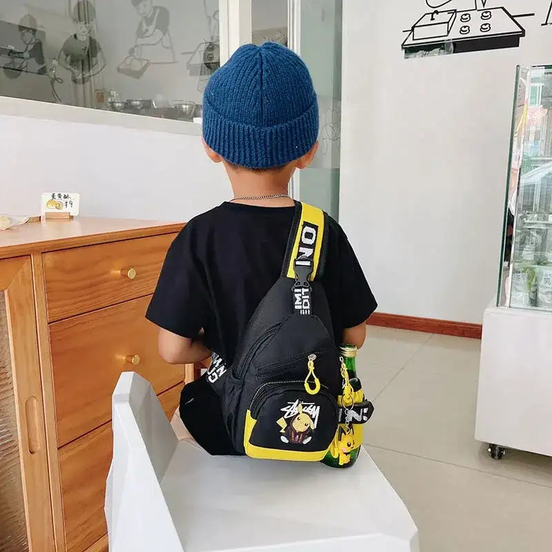 Child’s black and yellow Pikachu sling bag.