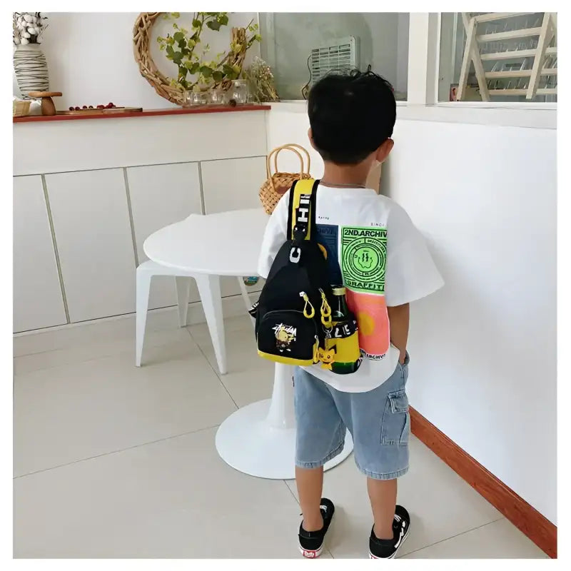 Child’s black and yellow Pikachu sling bag.