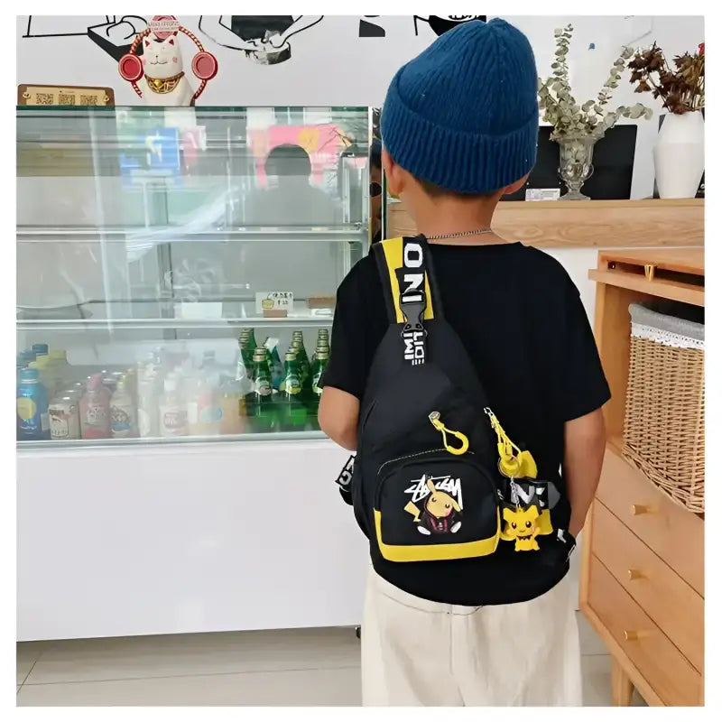 Child’s black and yellow Pikachu sling bag.