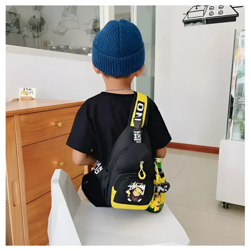 Child’s black and yellow Pikachu sling bag.