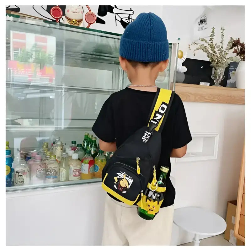 Child’s black and yellow sling bag.