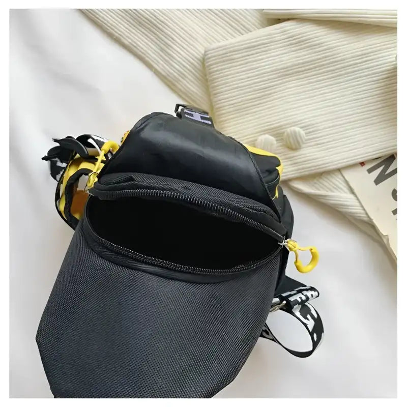 Open black and yellow bag.