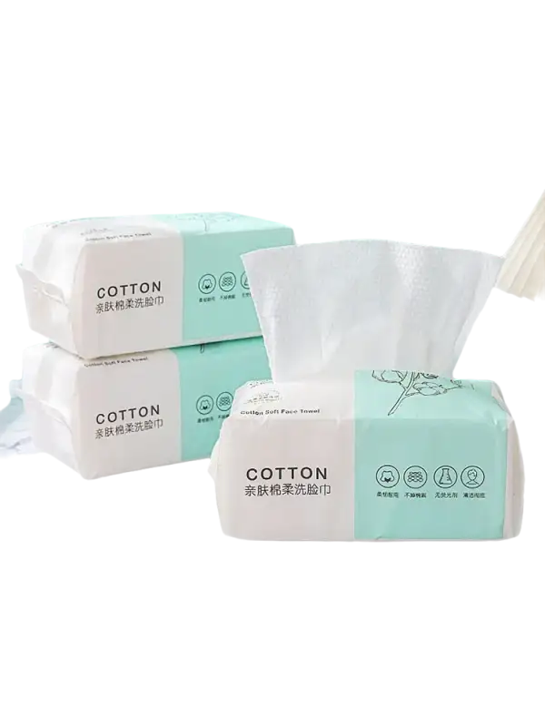 Stacked packages of cotton facial tissues.