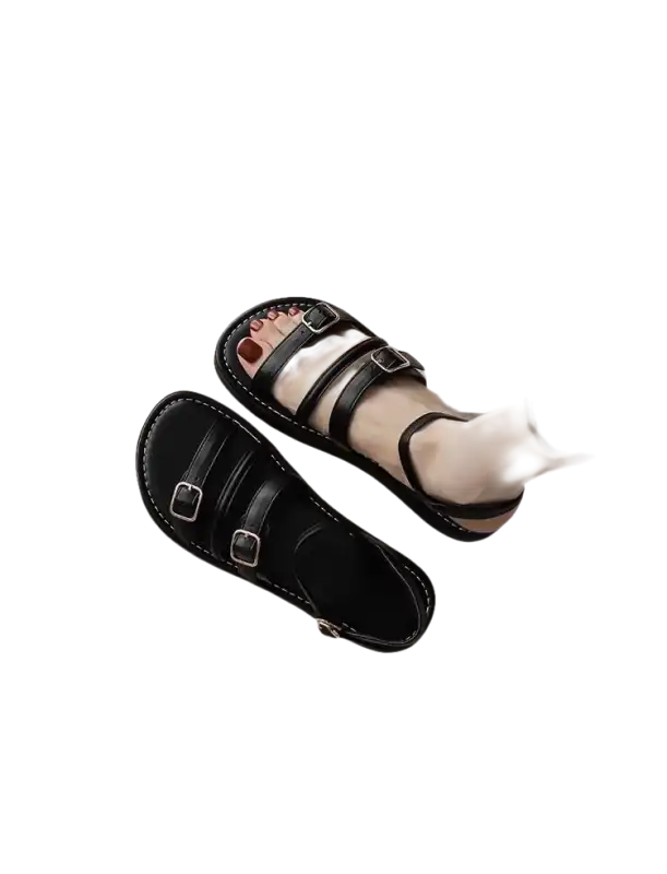 Black leather buckle sandals.