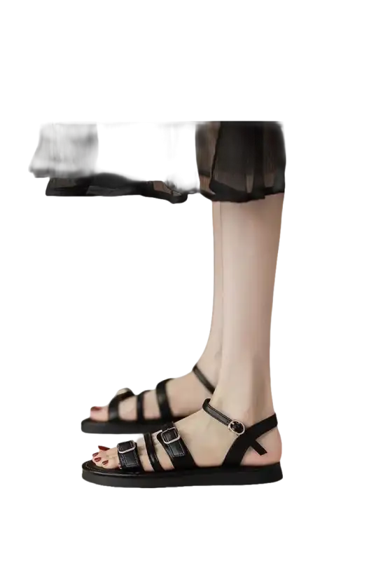 Black buckled sandal shoes.