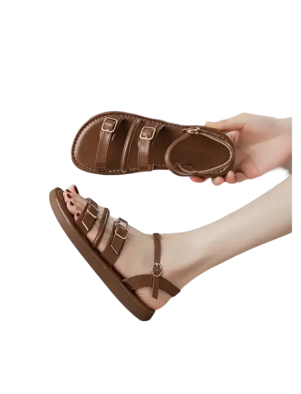 Brown leather buckled sandals.